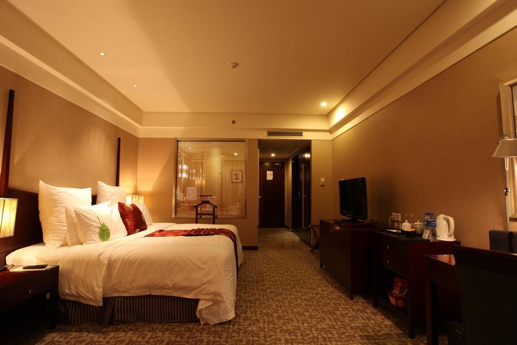 Ruiwan New Century Hotel Tianjin Zimmer foto